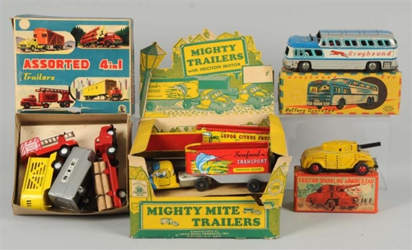 LOT OF ASSORTED TIN VEHICLE TOYS.                 