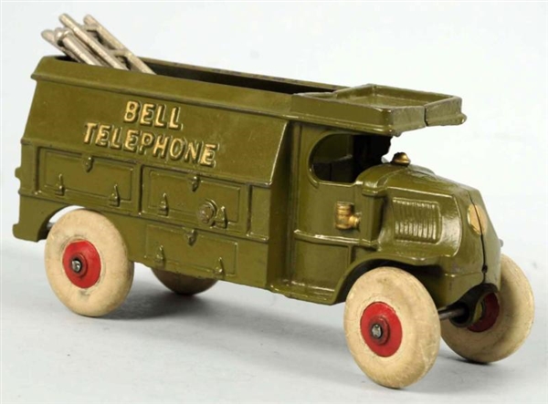CAST IRON HUBLEY BELL TELEPHONE TRUCK TOY.        