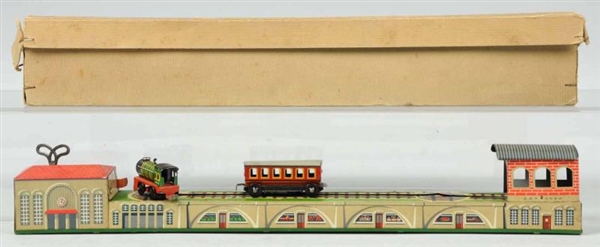TIN LITHO RAILROAD WIND-UP TOY.                   