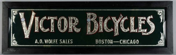VICTOR BICYCLES REVERSE GLASS SIGN.               