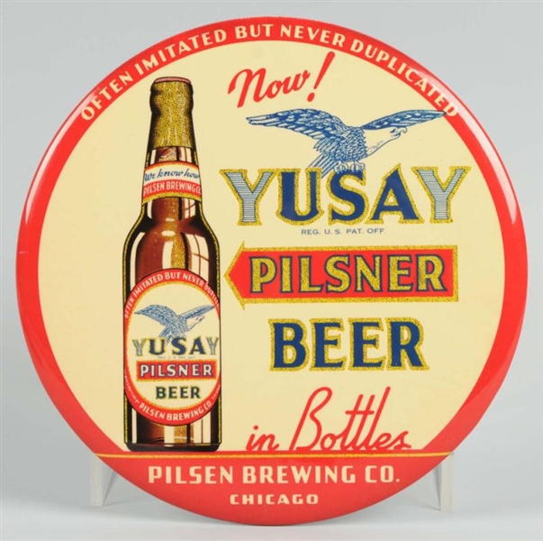 YUSAY PILSNER BEER CELLULOID BUTTON SIGN.         
