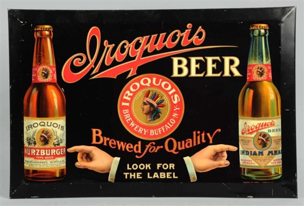 IROQUOIS BEER TIN OVER CARDBOARD SIGN.            