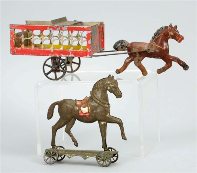 LOT OF 2: EARLY TIN HORSE TOYS.                   