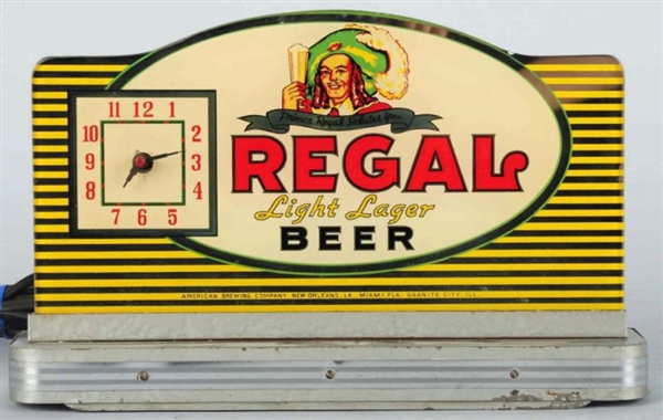 REGAL BEER REVERSE GLASS LIGHT-UP CLOCK.          