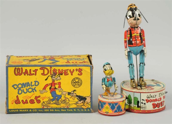 TIN LITHO MARX DONALD DUCK DUET WIND-UP TOY.      