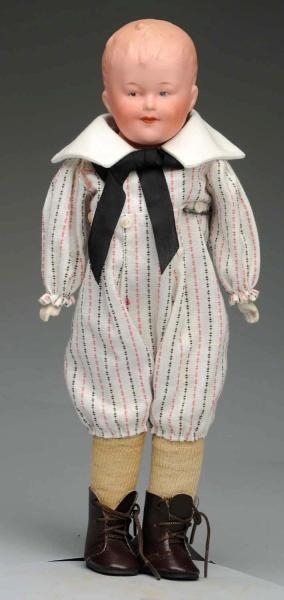 SMILING HEUBACH CHARACTER DOLL.                   