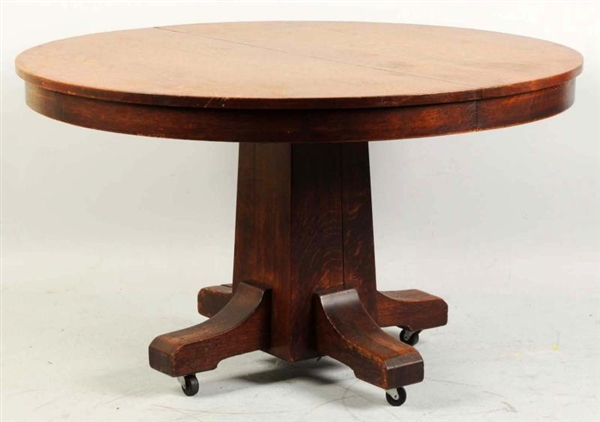 ROUND OAK TABLE SIGNED STICKLEY.                  