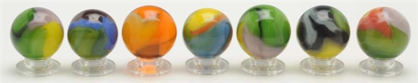LOT OF 7: VITRO AGATE MARBLES.                    