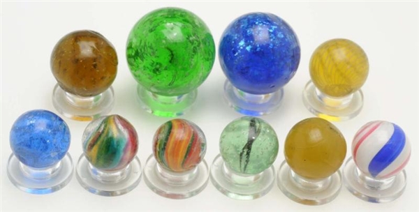 LOT OF 10: ASSORTED HANDMADE MARBLES.             