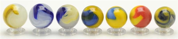 LOT OF 7: AKRO AGATE ASSORTED MARBLES.            