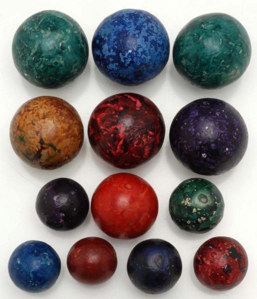 LOT OF 13: LARGE PAINTED CLAY MARBLES.            