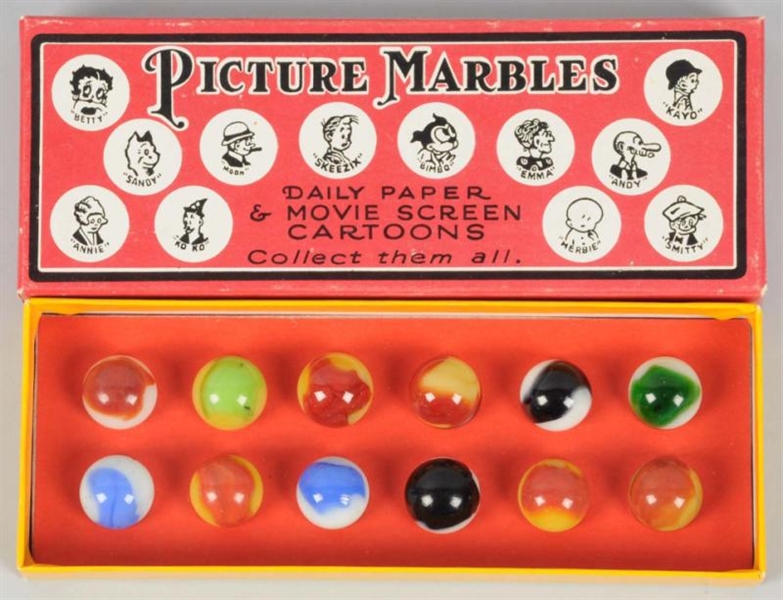 SET OF PELTIER COMIC MARBLES IN CONTEMPORARY BOX. 