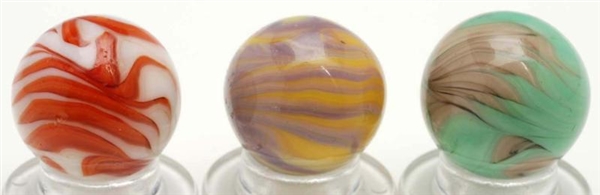 LOT OF 3: CHRISTENSEN AGATE FLAME MARBLES.        