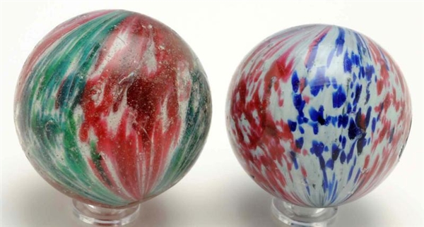 LOT OF 2: LARGE 4-PANELED ONIONSKIN MARBLES.      