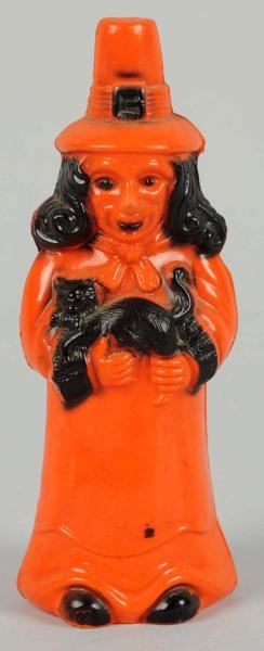 CELLULOID HALLOWEEN WITCH HOLDING CAT FIGURE.     