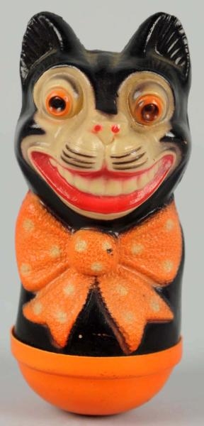 CELLULOID HALLOWEEN SMILING CAT ROLY POLY.        