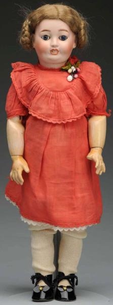 SMILING FRENCH CHARACTER DOLL.                    