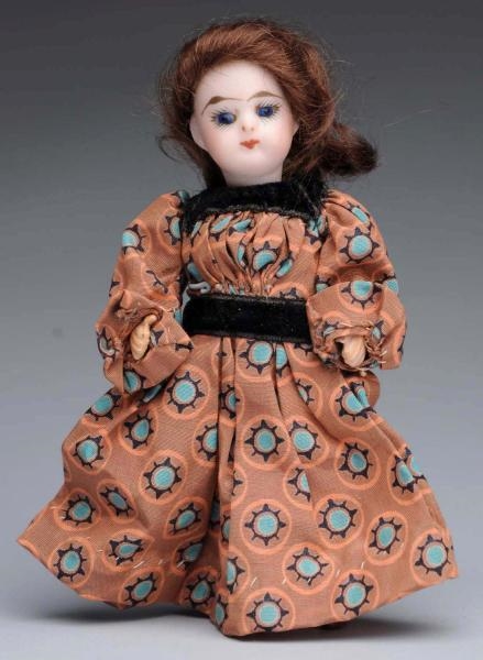 FRENCH BISQUE CHILD DOLL.                         