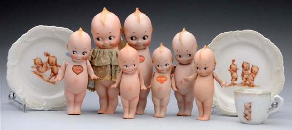 LOT OF 7: ALL-BISQUE KEWPIES.                     