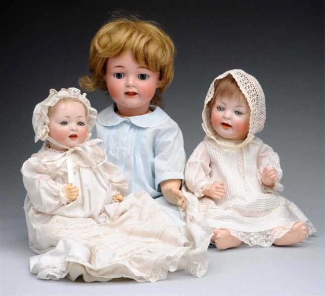 LOT OF 3: BISQUE CHARACTER DOLLS.                 