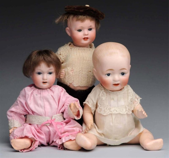 LOT OF 3: BISQUE BABY DOLLS.                      