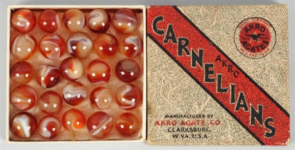 AKRO AGATE BOX SET OF NO. 1 CARNELIAN MARBLES.    