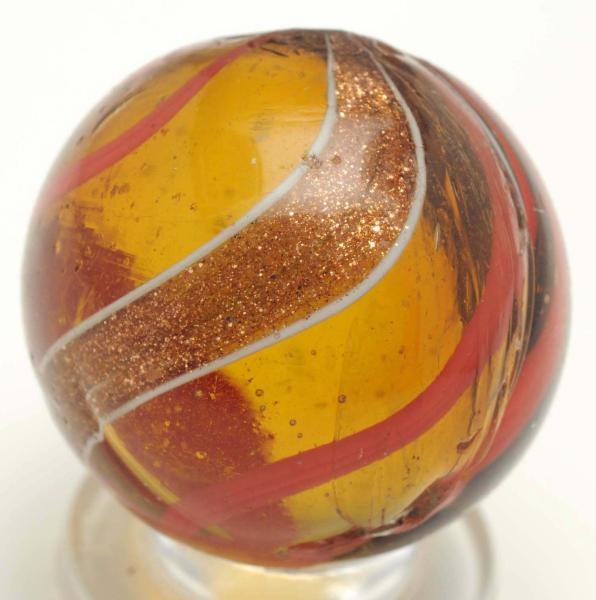 AMBER GLASS BANDED LUTZ MARBLE.                   