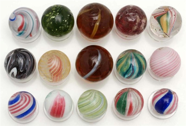 LOT OF 15: ASSORTED HANDMADE MARBLES.             