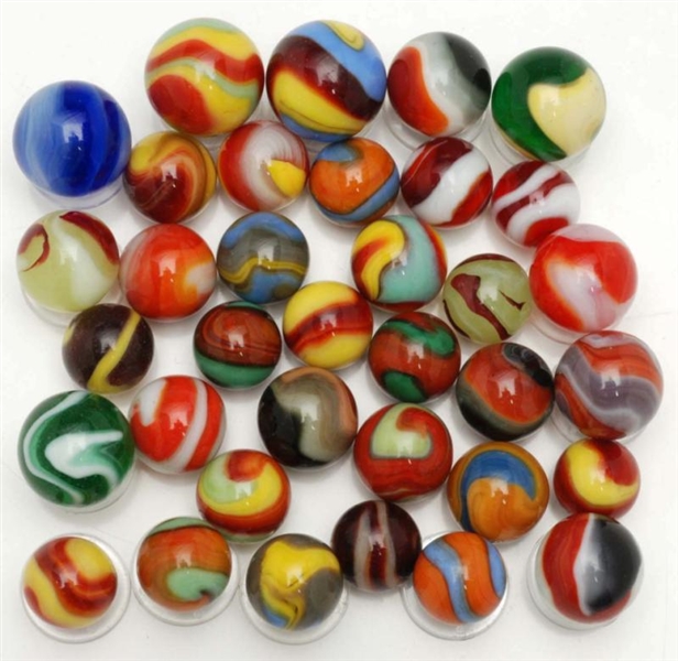 LOT OF 35: ASSORTED AKRO MARBLES.                 