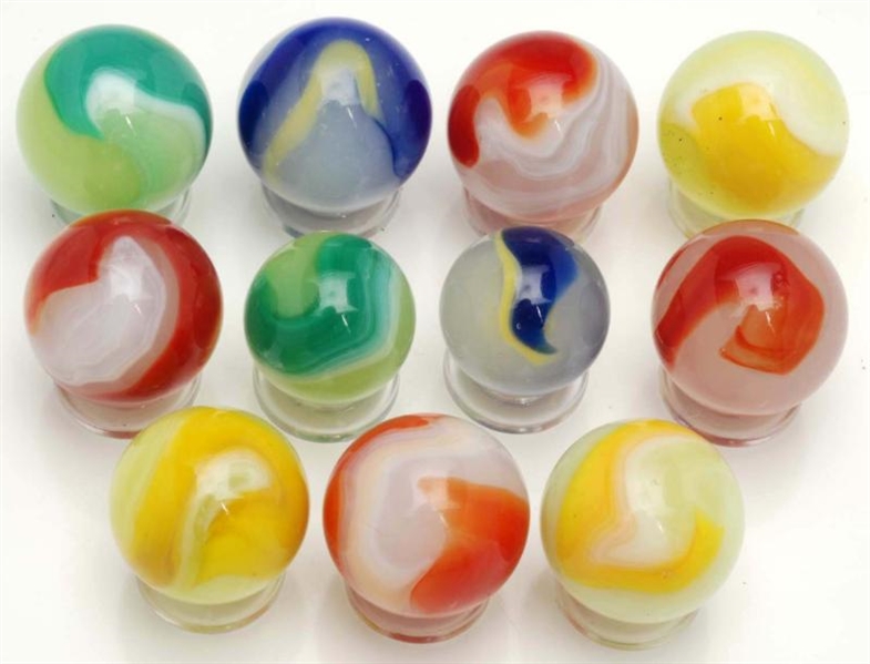 LOT OF 11: AKRO AGATE MARBLES.                    
