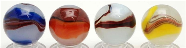LOT OF 4: AKRO AGATE OXBLOOD MARBLES.             