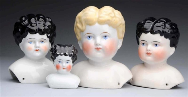 LOT OF 4: GERMAN CHINA DOLL HEADS.                