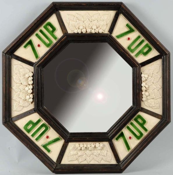 7-UP MIRROR WITH HIGH RELIEF TILE SURROUND.       