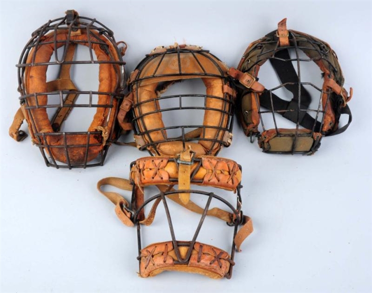 LOT OF 4: EARLY CATCHERS MASKS.                  