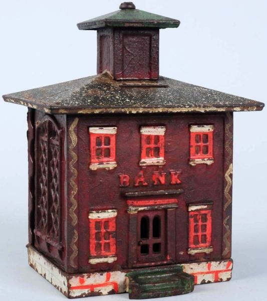 CAST IRON RED HOUSE STILL BANK.                   