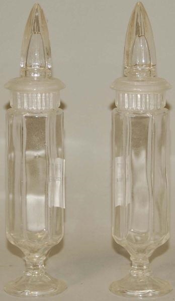 PAIR OF CANDY JARS W/ GROUND STOPPERS.            