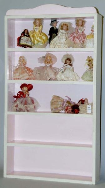 GLASS AND WOOD DISPLAY WITH FIFTEEN DOLLS.        