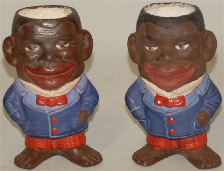 LOT OF 2: COMPOSITION BLACK MAN PENCIL HOLDERS.   