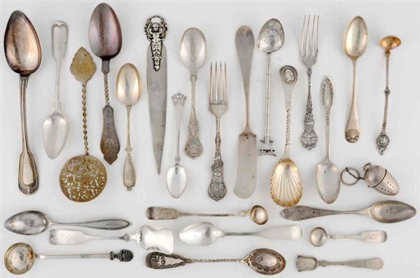 A MISCELLANEOUS GROUP OF SILVER SPOONS.           