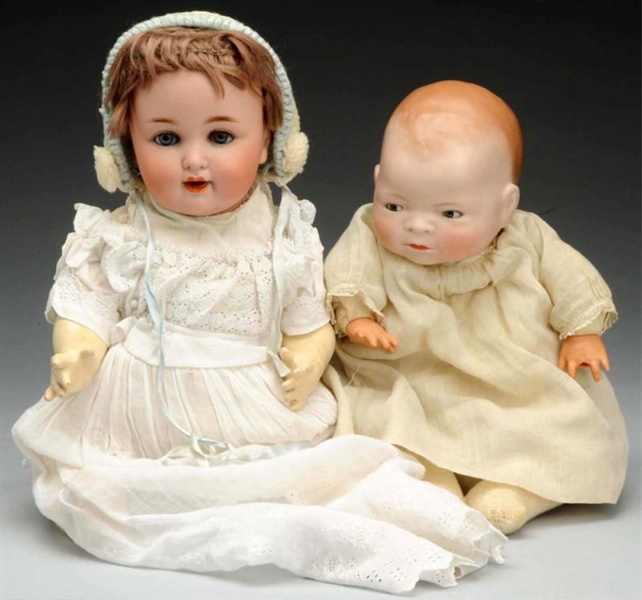 TWO BISQUE BABY DOLLS.                            