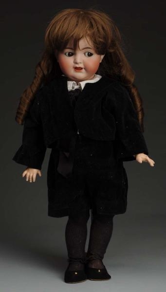 CUTE GERMAN BISQUE CHARACTER DOLL.                