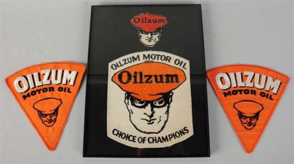 LOT OF 4: OILZUM CLOTH PATCHES.                   