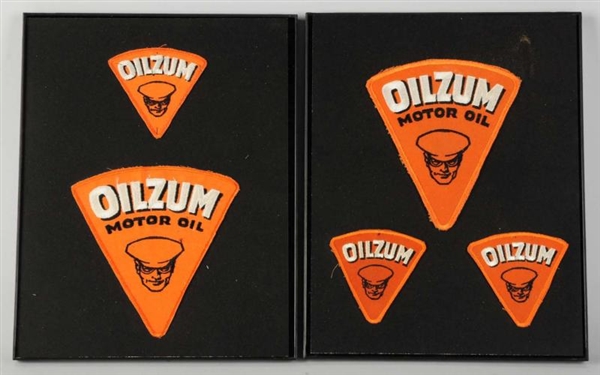 GROUP OF 5 OILZUM PATCHES.                        