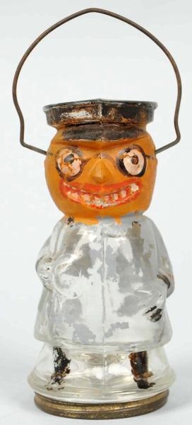 GLASS PUMPKIN HEAD CANDY CONTAINER.               