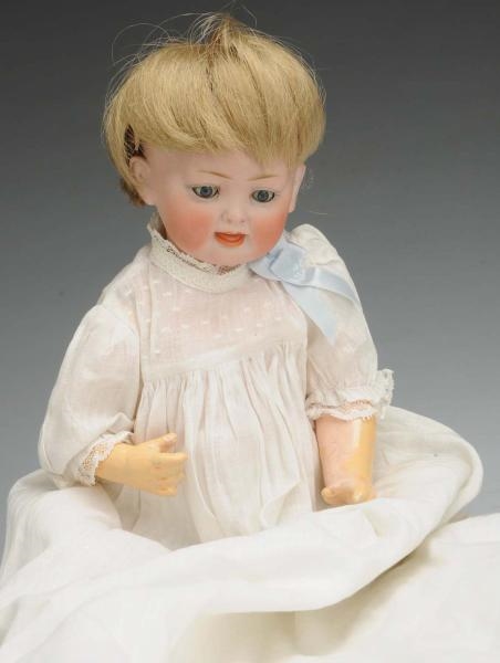 GERMAN BISQUE CHARACTER BABY DOLL.                