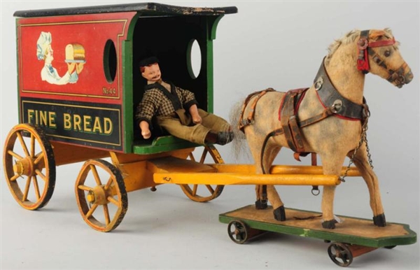 SCHOENHUT HORSE-DRAWN FINE BREAD WAGON.           