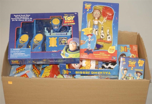 LOT OF ASSORTED TOY STORY TOYS IN BOXES.          