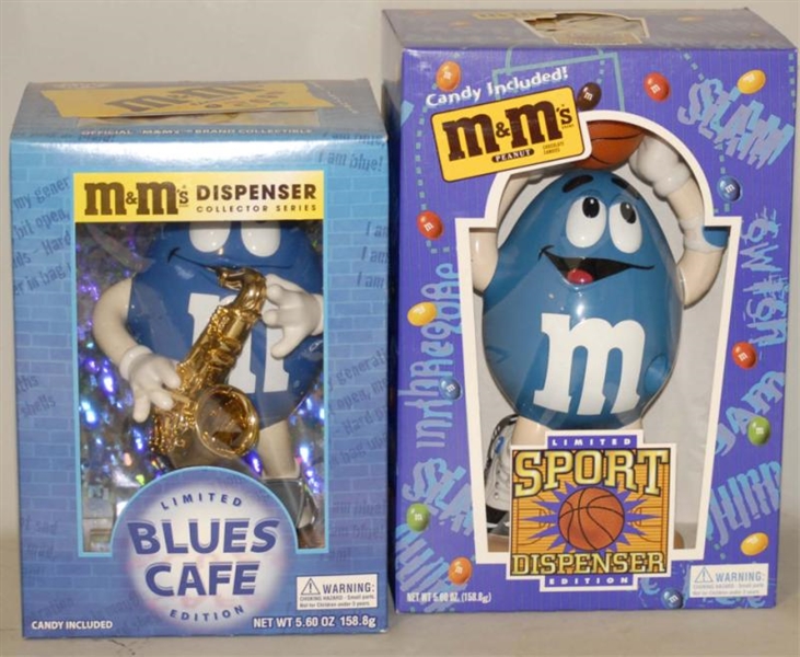 LOT OF M&M TOYS IN BOXES.                         