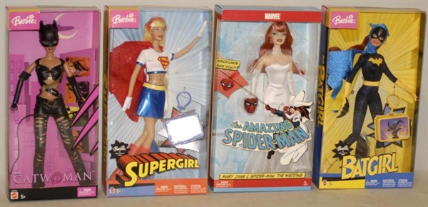 LOT OF 7: BARBIE SUPERHEROES IN BOXES.            
