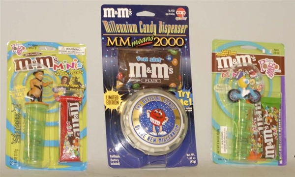 LOT OF ASSORTED M&M TOYS IN BOXES.                